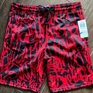 Red and Black Graphic Board Shorts. Men’s medium